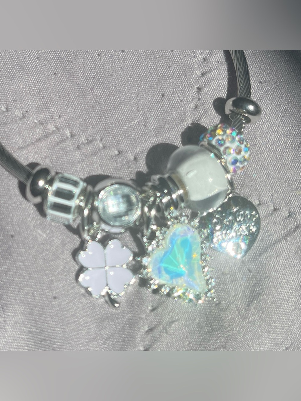 Silver Charm Bracelet with White and Iridescent Heart Charms